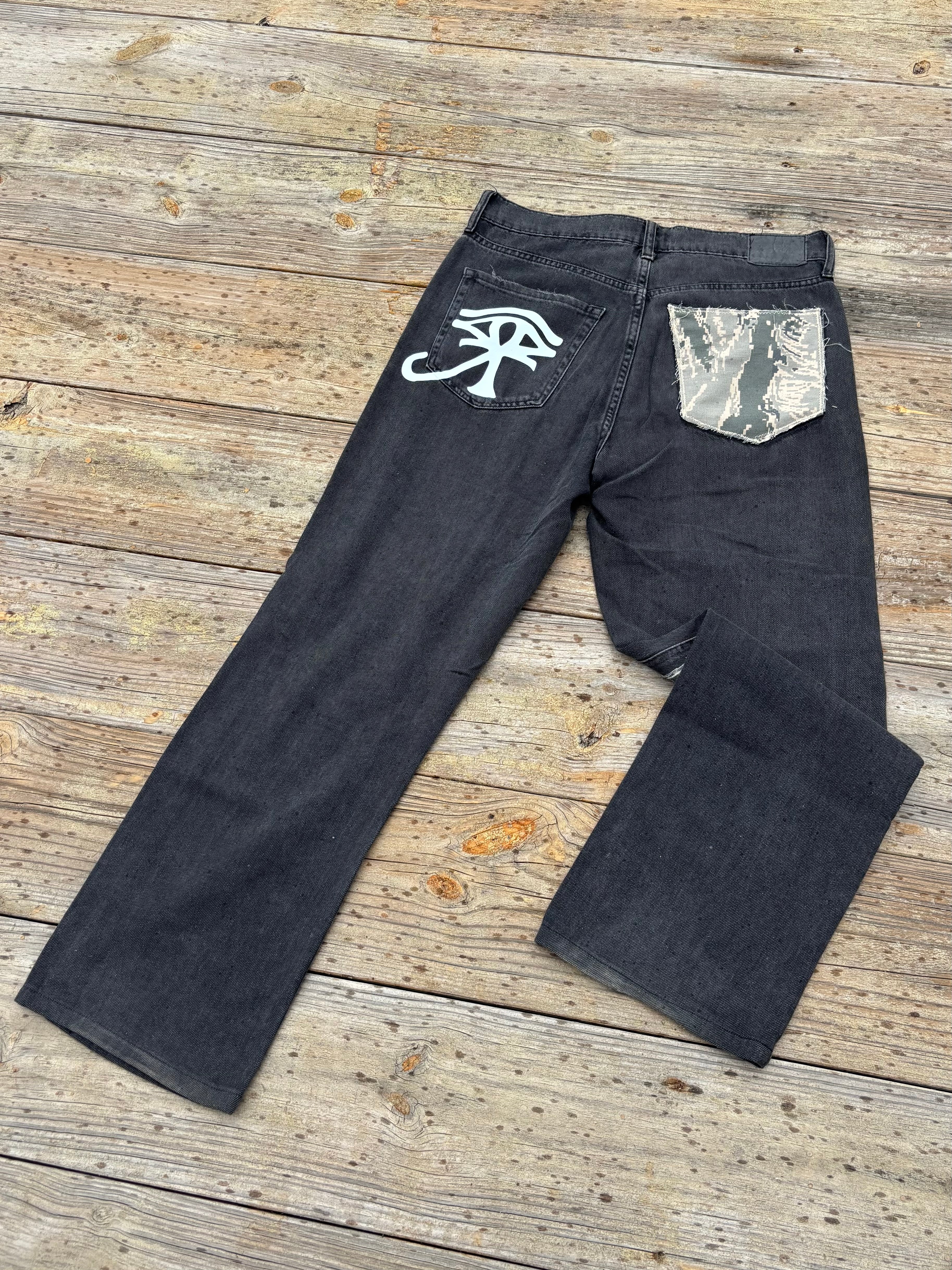 1 of ⇂ CAMO LEG JEANS